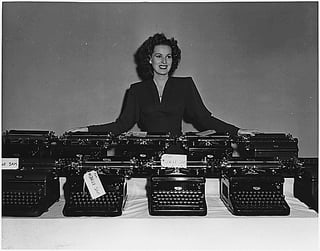 Taking time off between the shooting of scenes at the RKO Studios in Hollywood, Miss [Maureen] O'Hara helped collect more than 70 typewriters for future use by the Army, Navy, and Marines