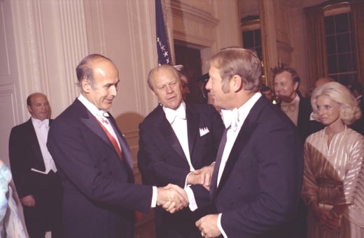 President Gerald R. Ford and President Valery Giscard d'Estaing of France Greeting Baseball Player Mickey Mantle in the Receiving Line at a State Dinner Honoring President Giscard d'Estaing