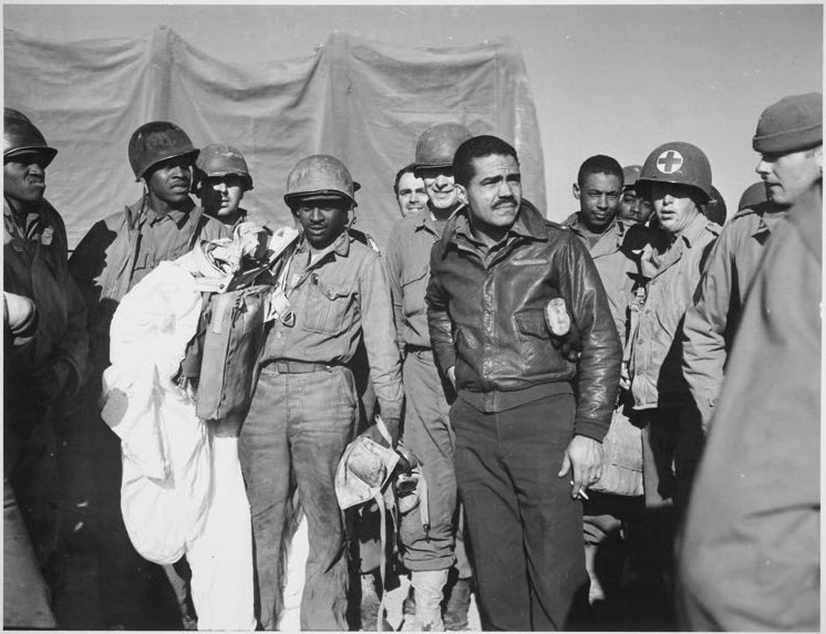 Black and white photograph of a group of service members