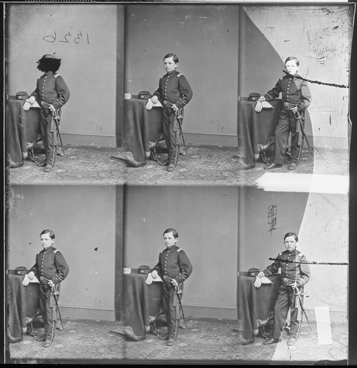 Black and white studio photograph of Tad Lincoln. The photograph is shown in a group of 6 images