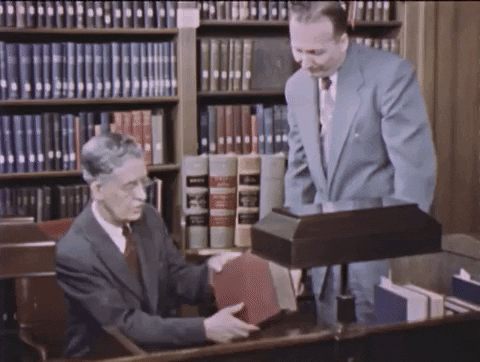 researcher helping another patron