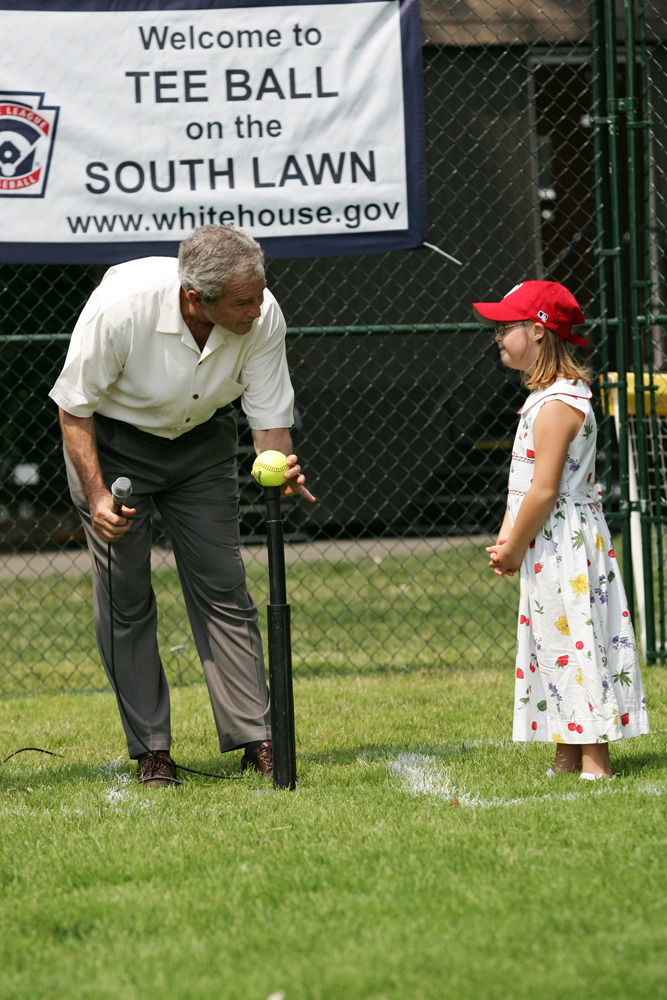  President George W. Bush Places a Ball on the Tee to Start the 2007 White House Tee Ball Season on the South Lawn